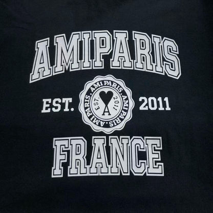 Camiseta AMI Paris Badge Varsity