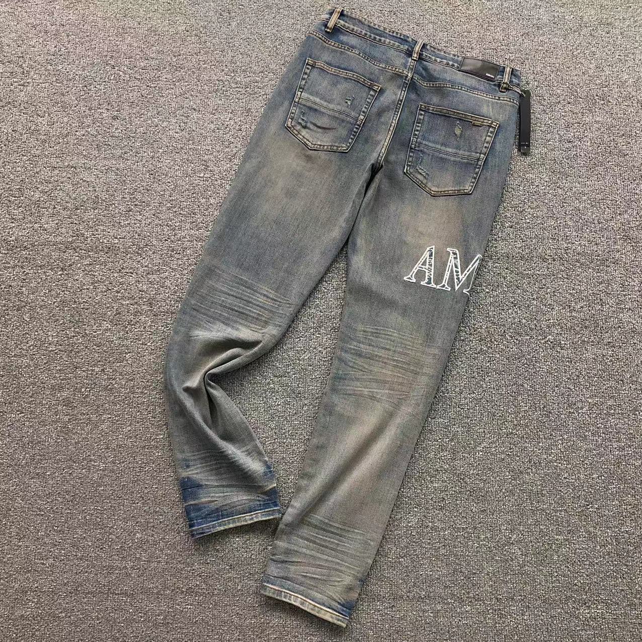 Calça AMIRI Vintage Logo Washed Denim