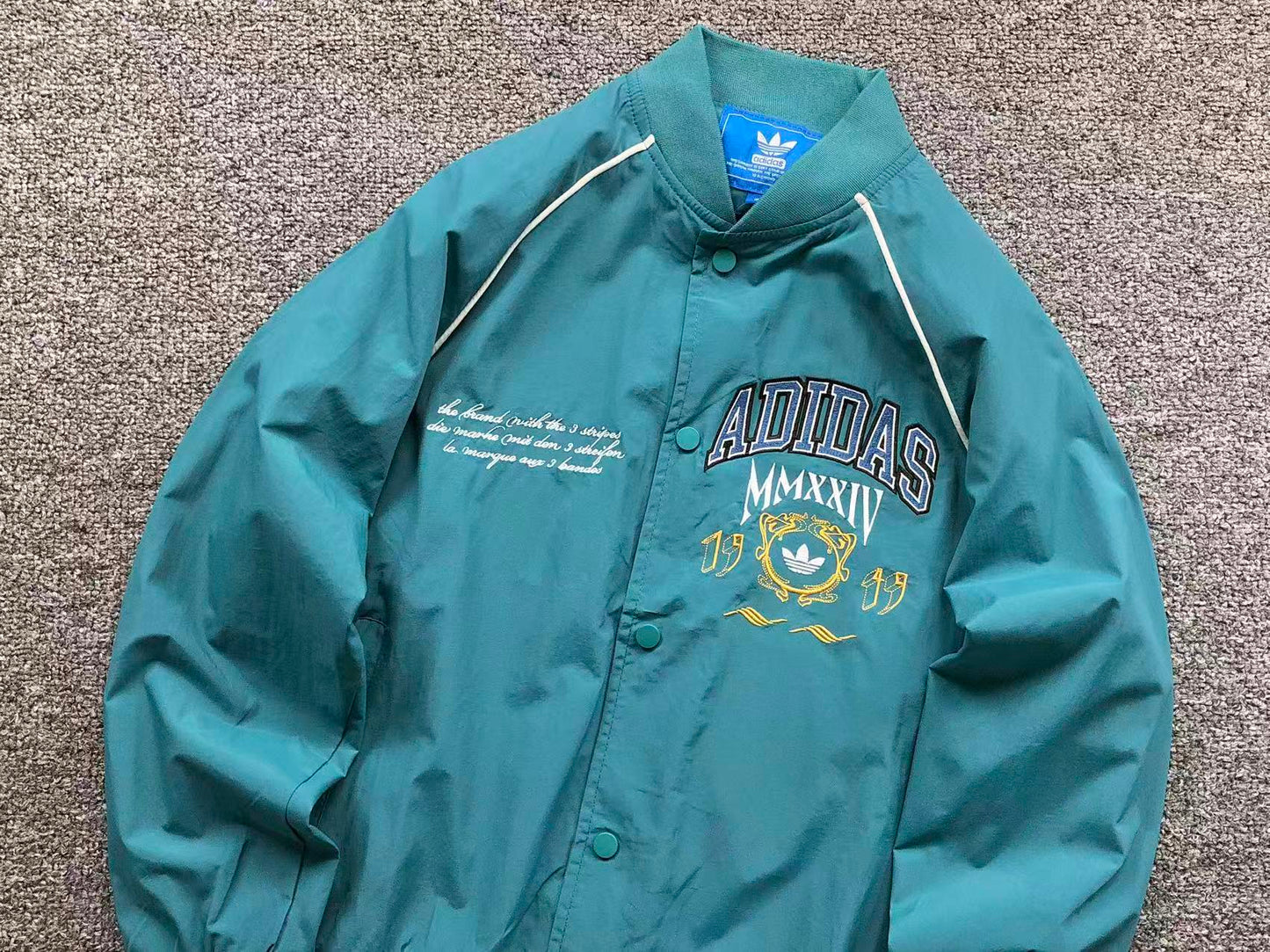 Jaqueta adidas MMXXIV Varsity