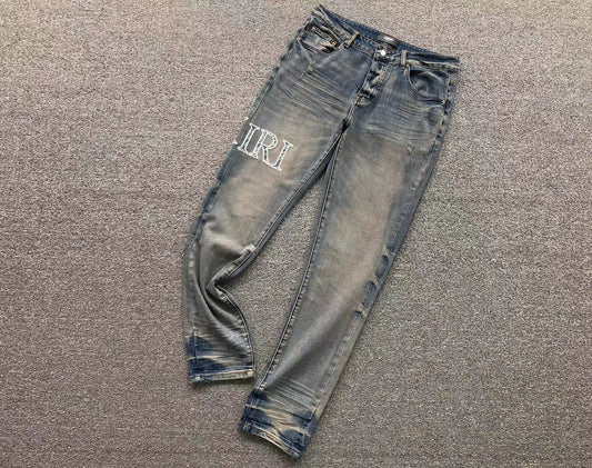 Calça AMIRI Vintage Logo Washed Denim