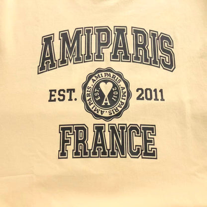 Camiseta AMI Paris Badge Varsity