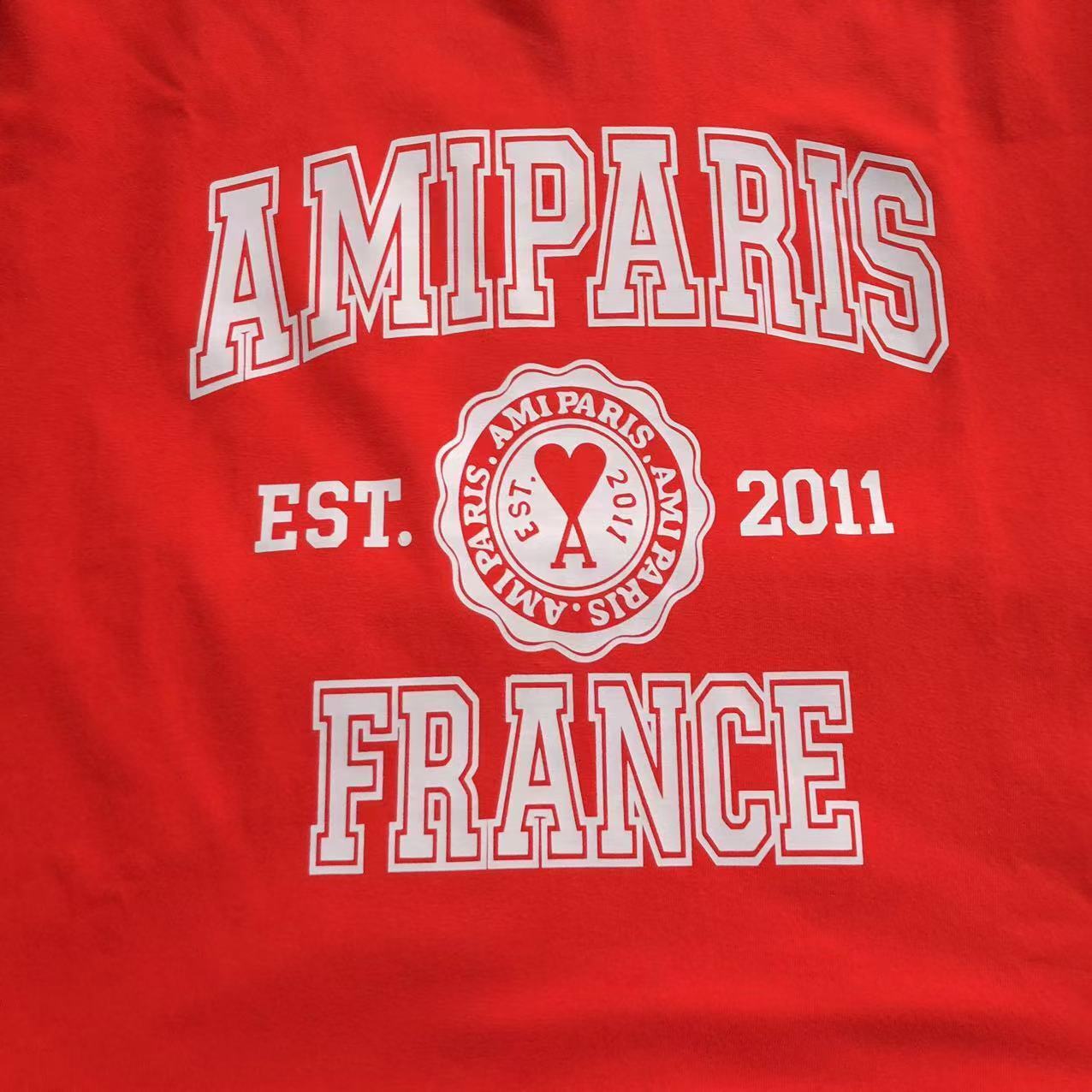 Camiseta AMI Paris Badge Varsity