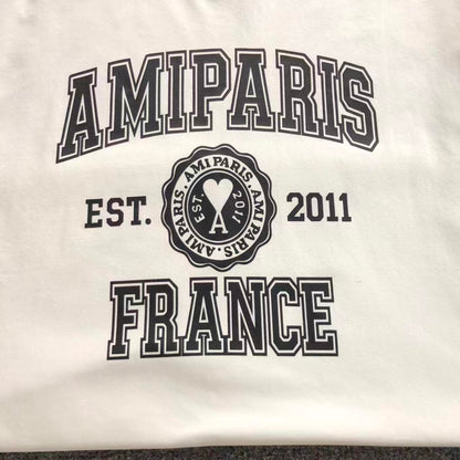 Camiseta AMI Paris Badge Varsity