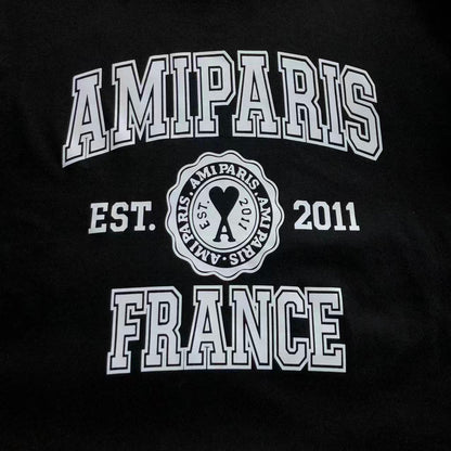 Camiseta AMI Paris Badge Varsity