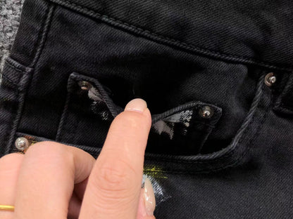 Calça AMIRI Logo Paint Splatter Black Denim
