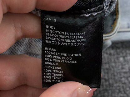 Calça AMIRI Ice Destroyed Paint Denim