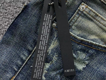 Calça AMIRI Vintage Blue Ribbed Destroyed Denim