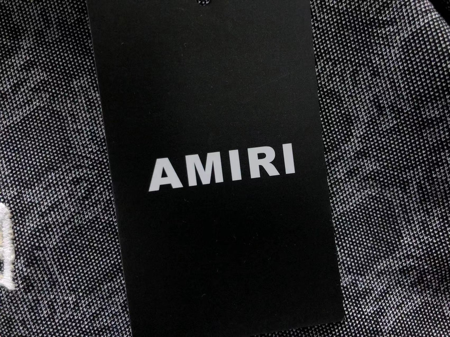 Conjunto AMIRI Monogram Track