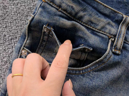 Calça AMIRI Vintage Logo Washed Denim