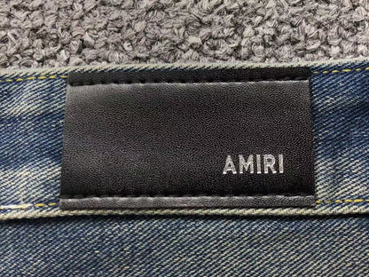 Calça AMIRI Gothic Patch Flared Trousers