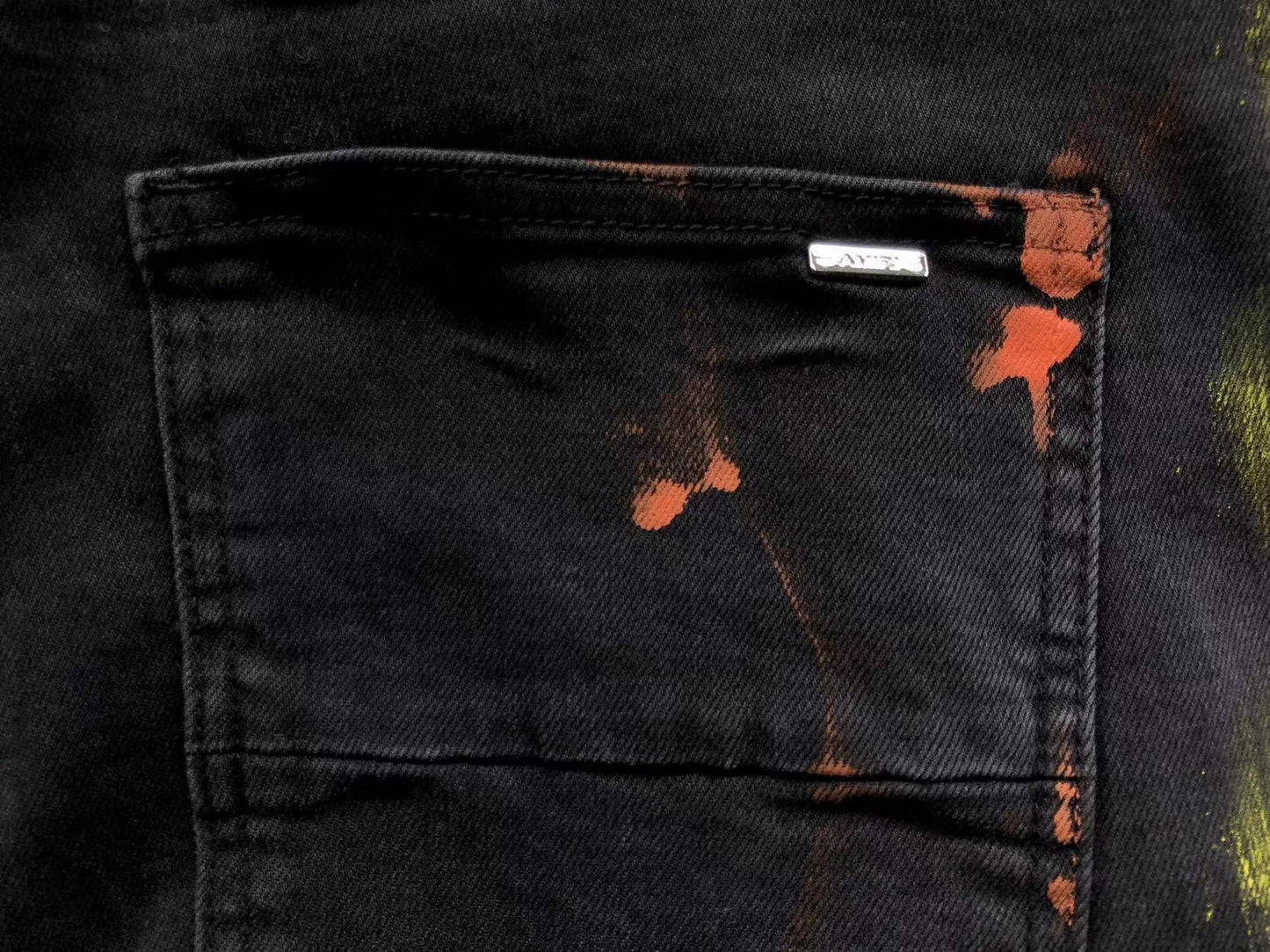 Calça AMIRI Logo Paint Splatter Black Denim