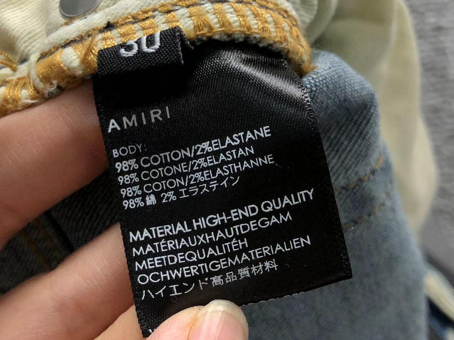 Calça AMIRI Light Wash Destroyed Denim