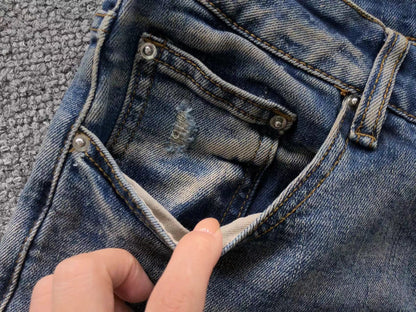 Calça AMIRI Vintage Logo Washed Denim