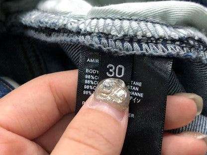 Calça AMIRI Vintage Destroyed Logo Denim (Ice Wash)