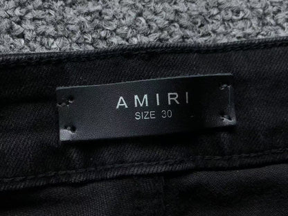 Calça AMIRI Bullet Hole Patch Black Denim