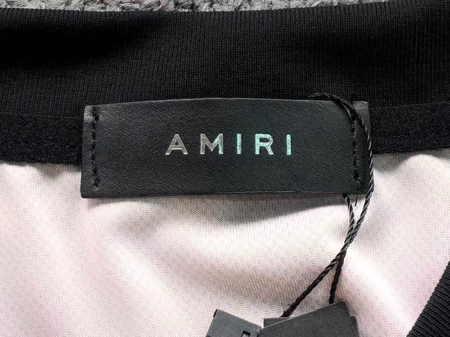 Camiseta AMIRI Champion XXVI Varsit