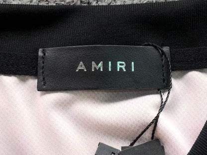 Camiseta AMIRI Champion XXVI Varsit