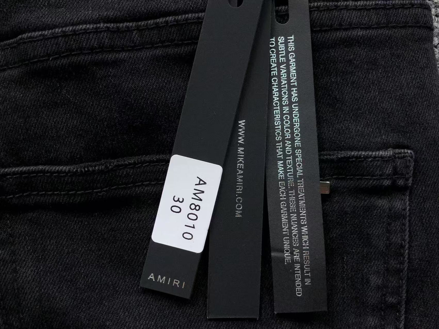 Calça AMIRI Bullet Hole Patch Black Denim