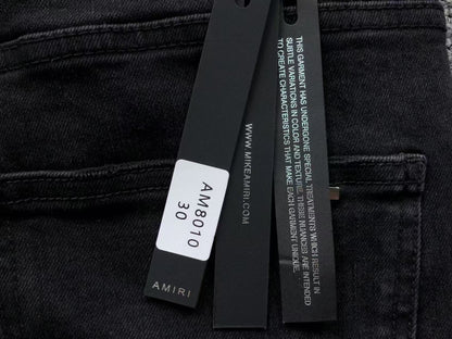 Calça AMIRI Bullet Hole Patch Black Denim