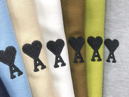 Camiseta Polo AMI Paris Piquet Logo Coração