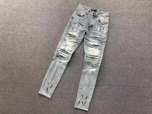 Calça AMIRI Ice Destroyed Paint Denim