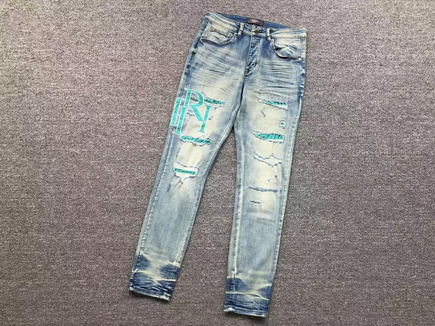 Calça AMIRI TR Ice Blue Distressed Denim