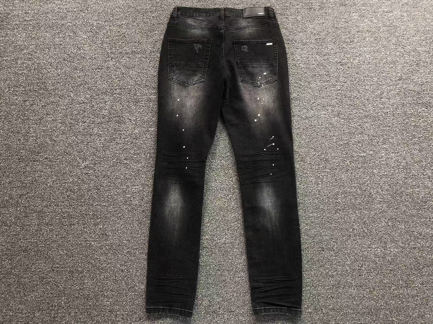 Calça AMIRI Black Paint Wash Denim