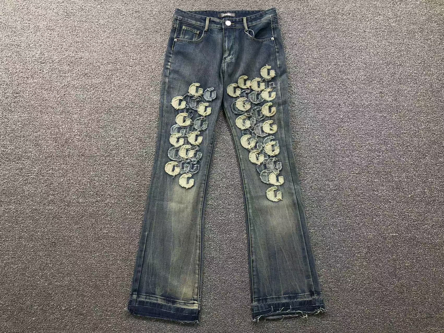 Calça AMIRI Gothic Patch Flared Trousers