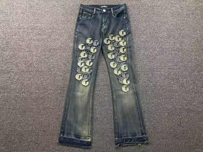 Calça AMIRI Gothic Patch Flared Trousers