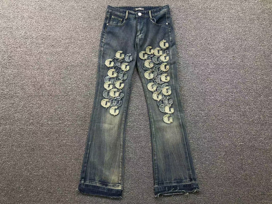 Calça AMIRI Gothic Patch Flared Trousers