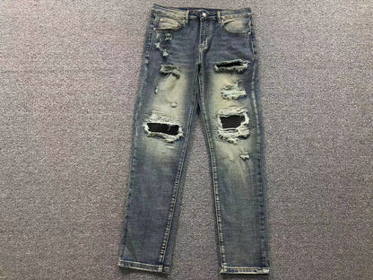 Calça AMIRI Vintage Blue Ribbed Destroyed Denim