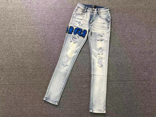 Calça AMIRI Ice Blue Patch Denim
