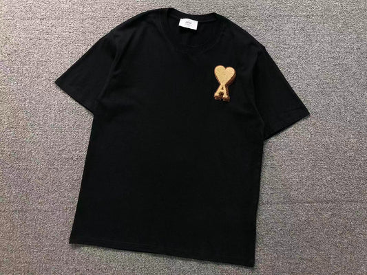 Camiseta AMI Paris Coração Dourado