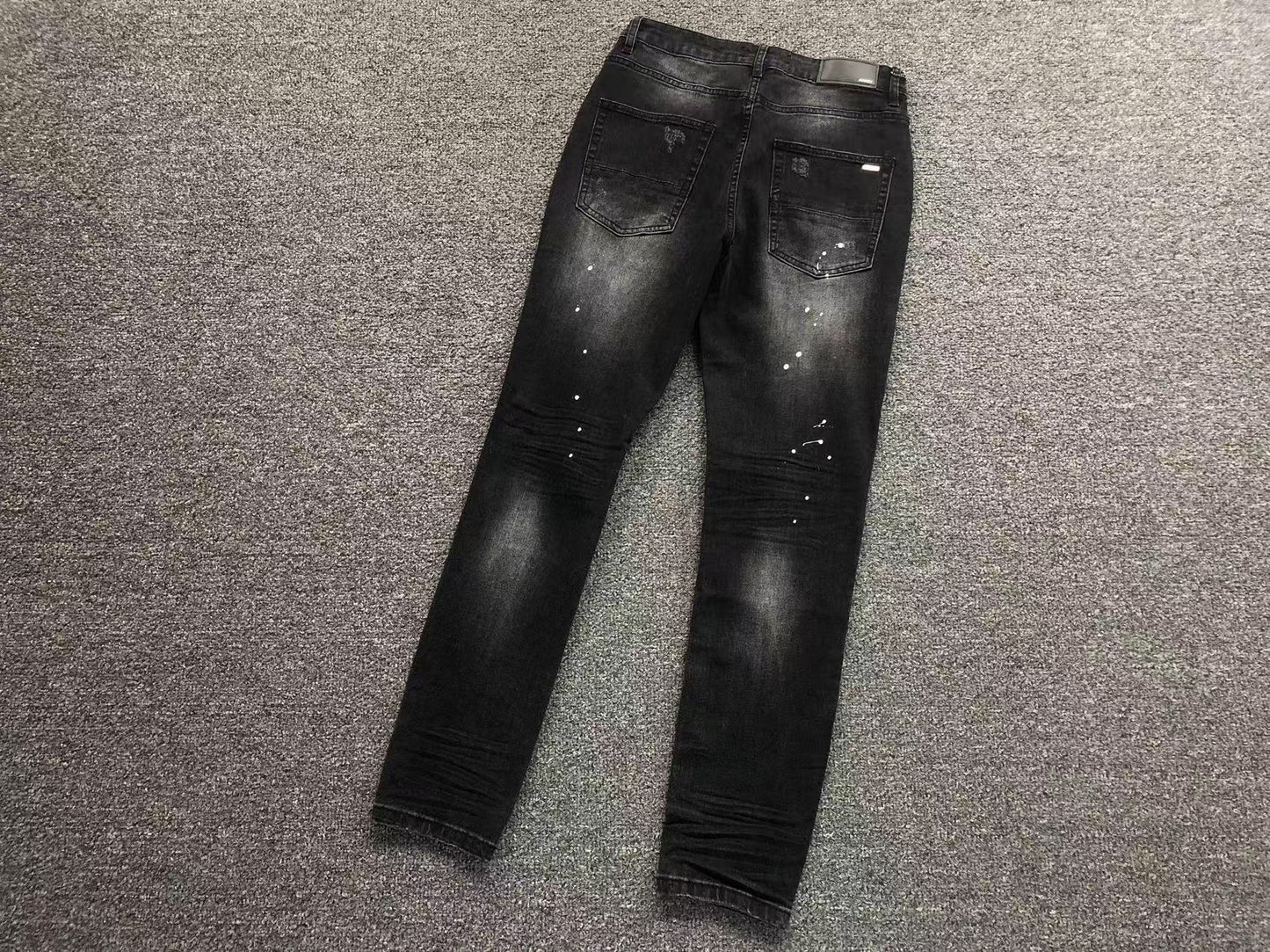 Calça AMIRI Black Paint Wash Denim