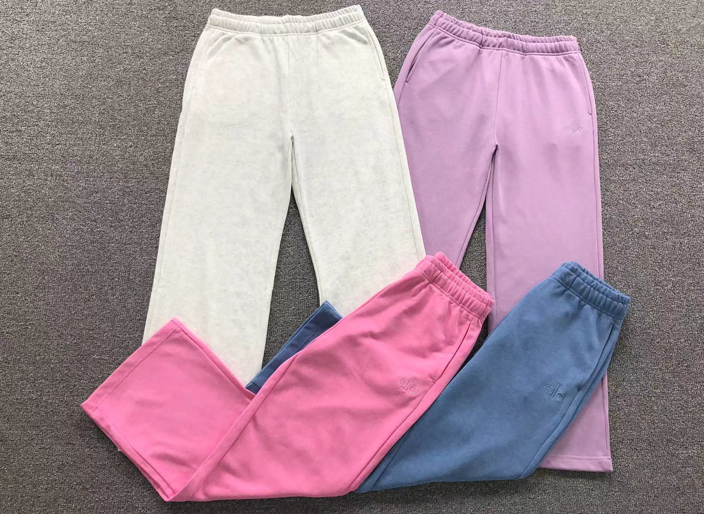 Calça elástica ALO moletom reta feminina
