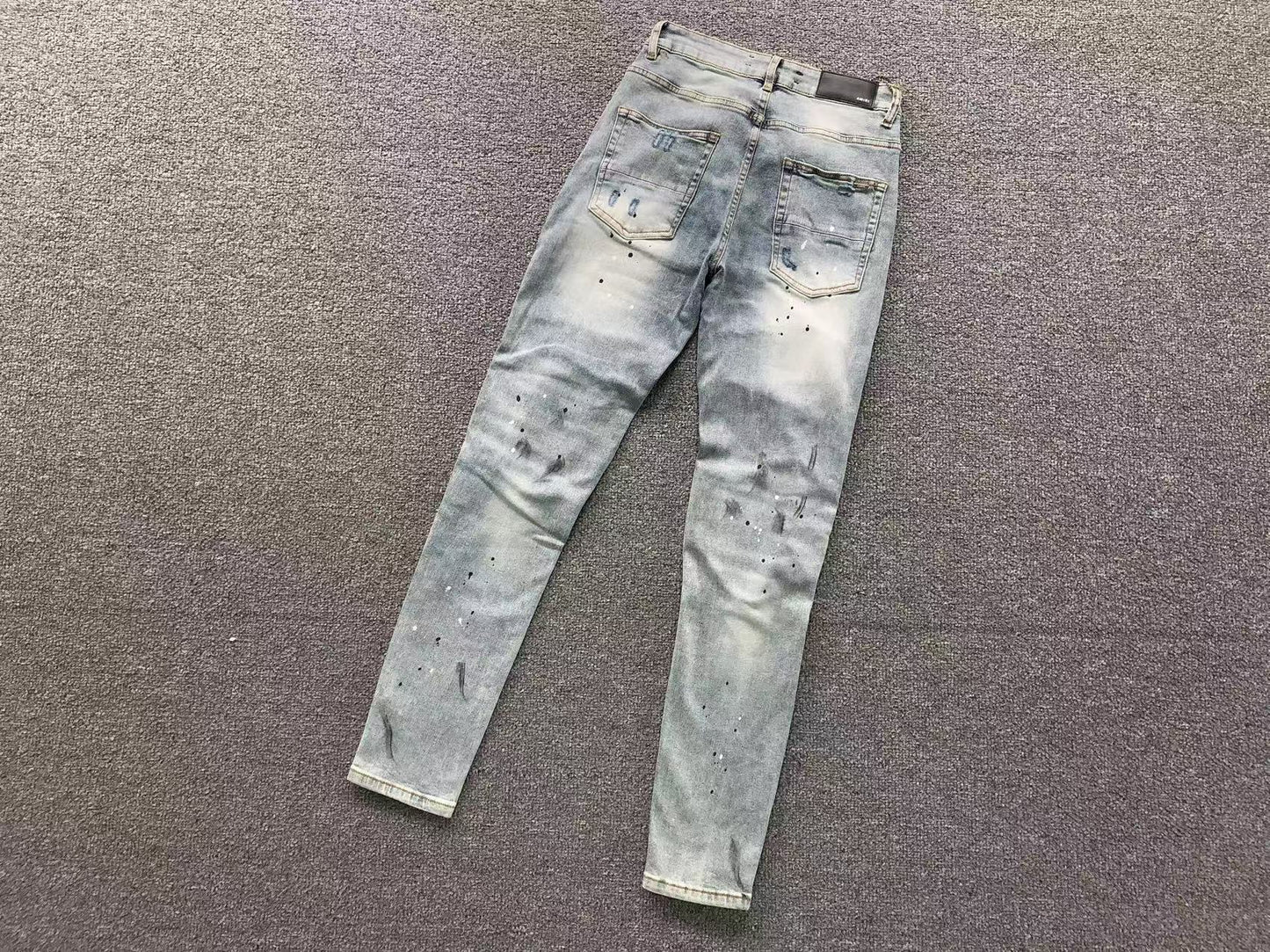 Calça AMIRI Ice Destroyed Paint Denim