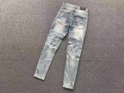 Calça AMIRI Ice Destroyed Paint Denim