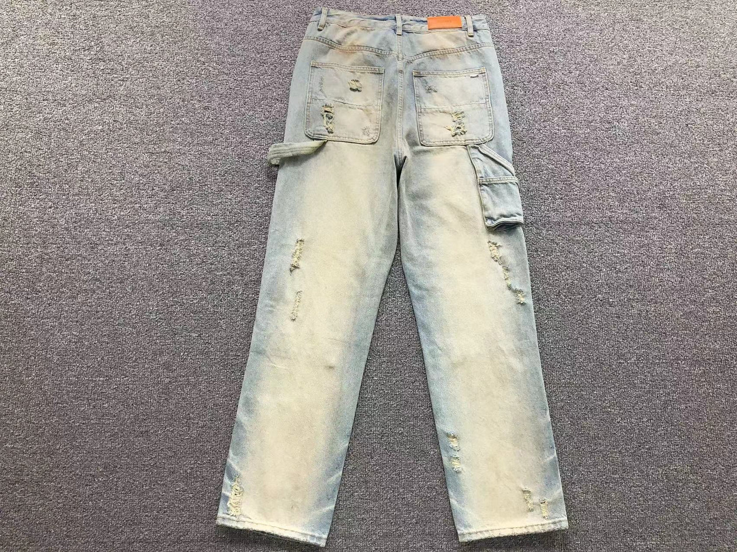 Calça AMIRI Dirty Wash Carpenter Jeans
