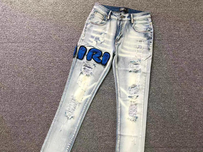 Calça AMIRI Ice Blue Patch Denim