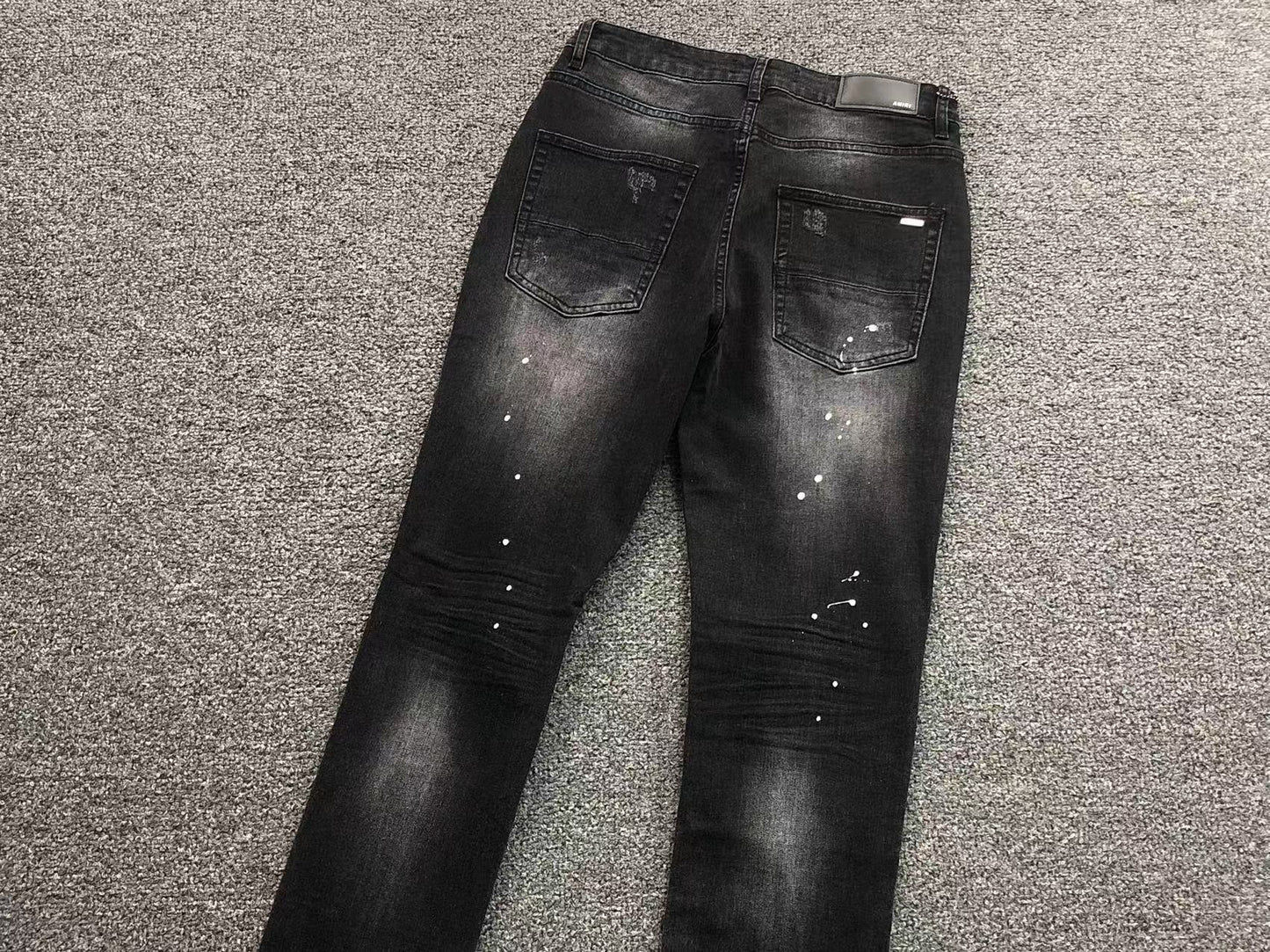 Calça AMIRI Black Paint Wash Denim