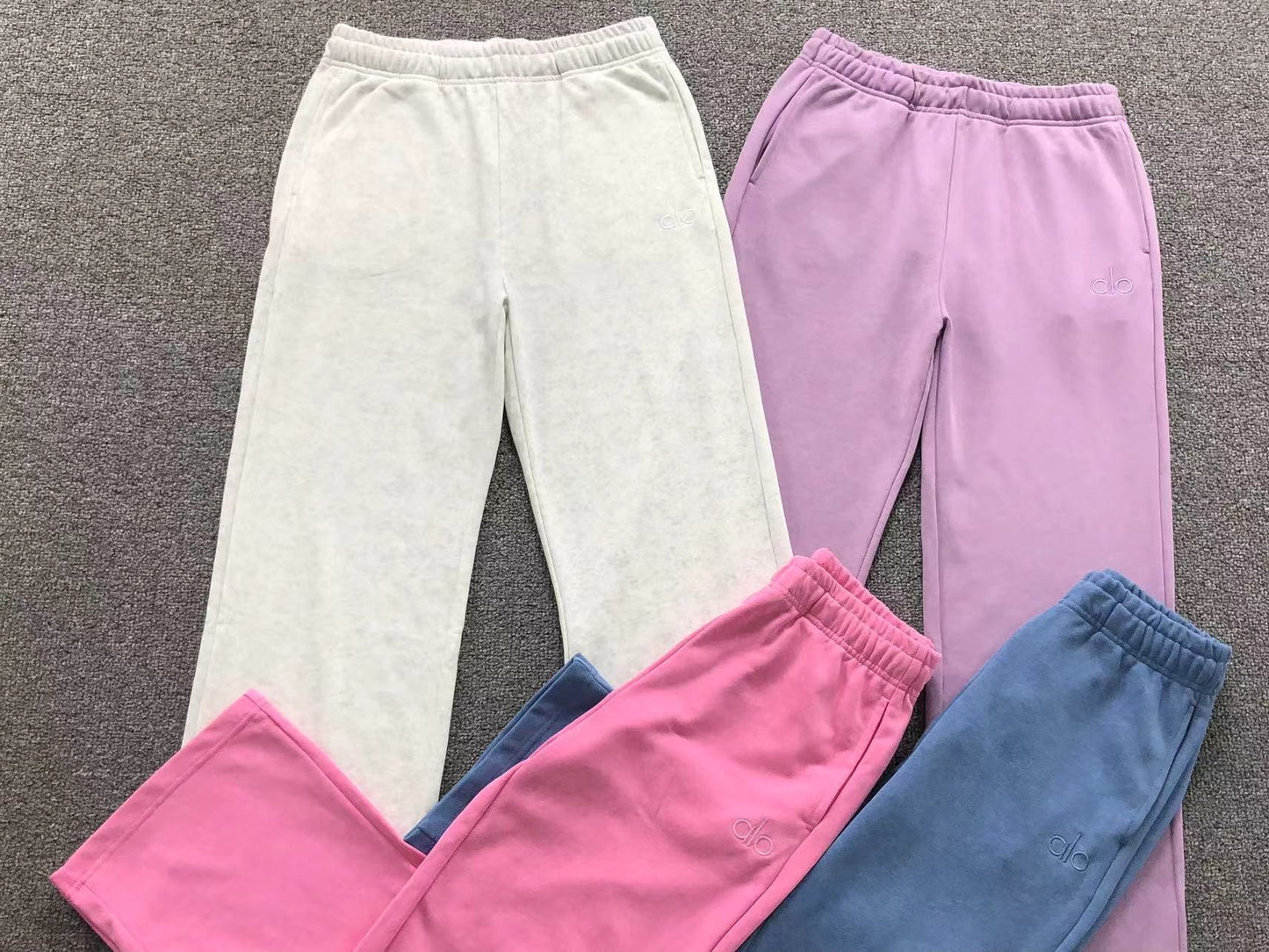 Calça elástica ALO moletom reta feminina