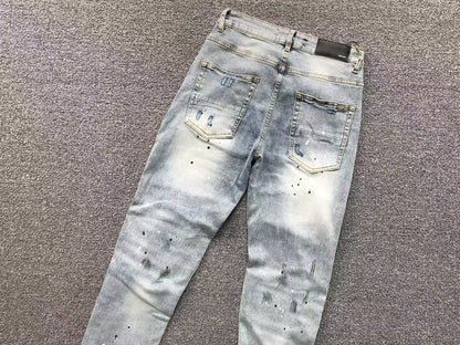 Calça AMIRI Ice Destroyed Paint Denim
