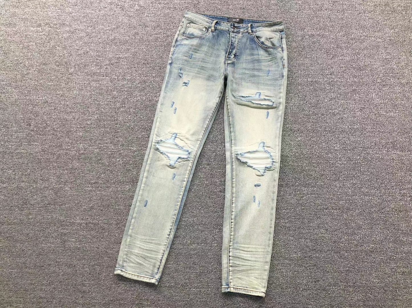 Calça AMIRI Destroyed Ice Wash