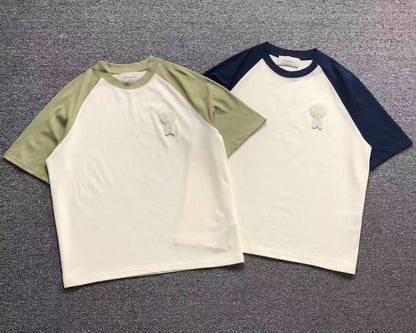 Camiseta AMI Paris Raglan Logo Coração