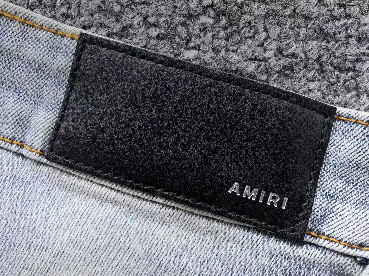 Calça AMIRI Ice Destroyed Paint Denim