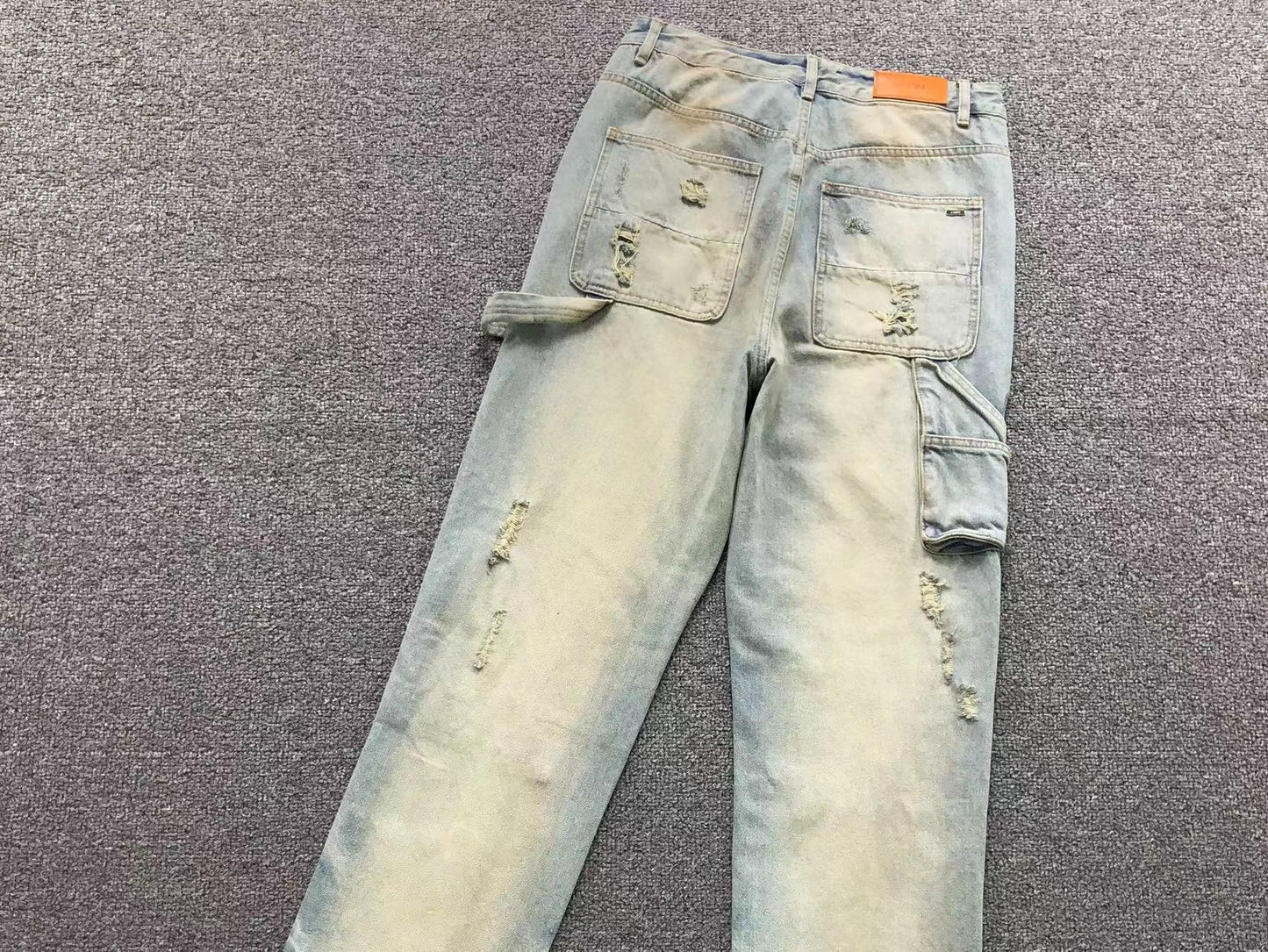 Calça AMIRI Dirty Wash Carpenter Jeans