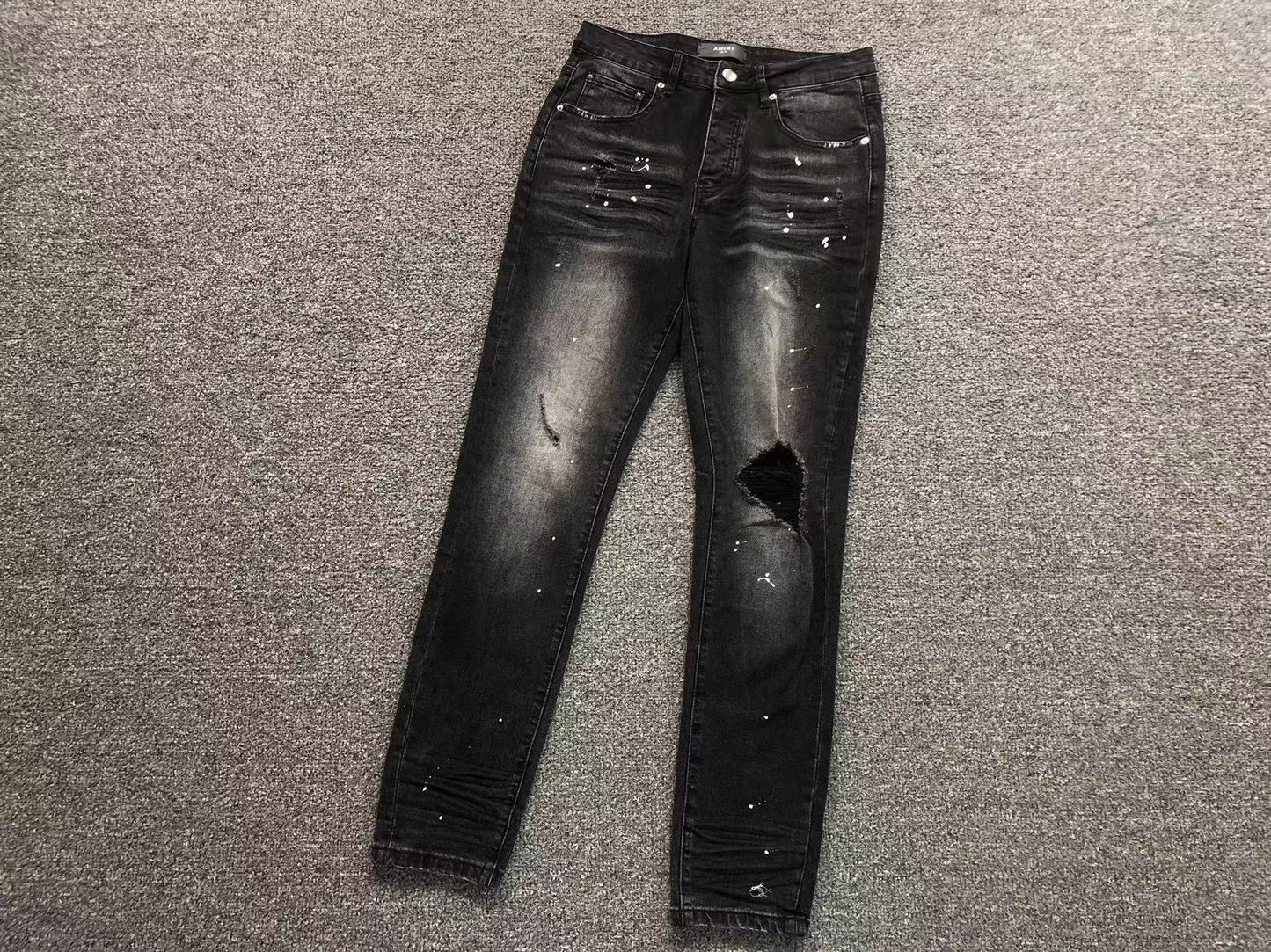 Calça AMIRI Black Paint Wash Denim