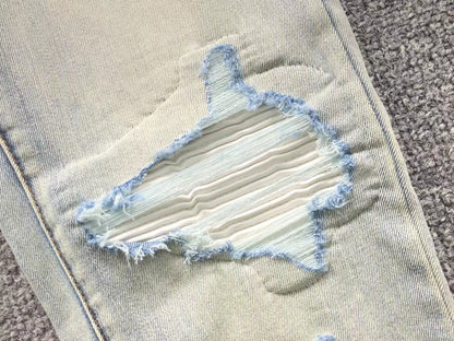 Calça AMIRI Destroyed Ice Wash