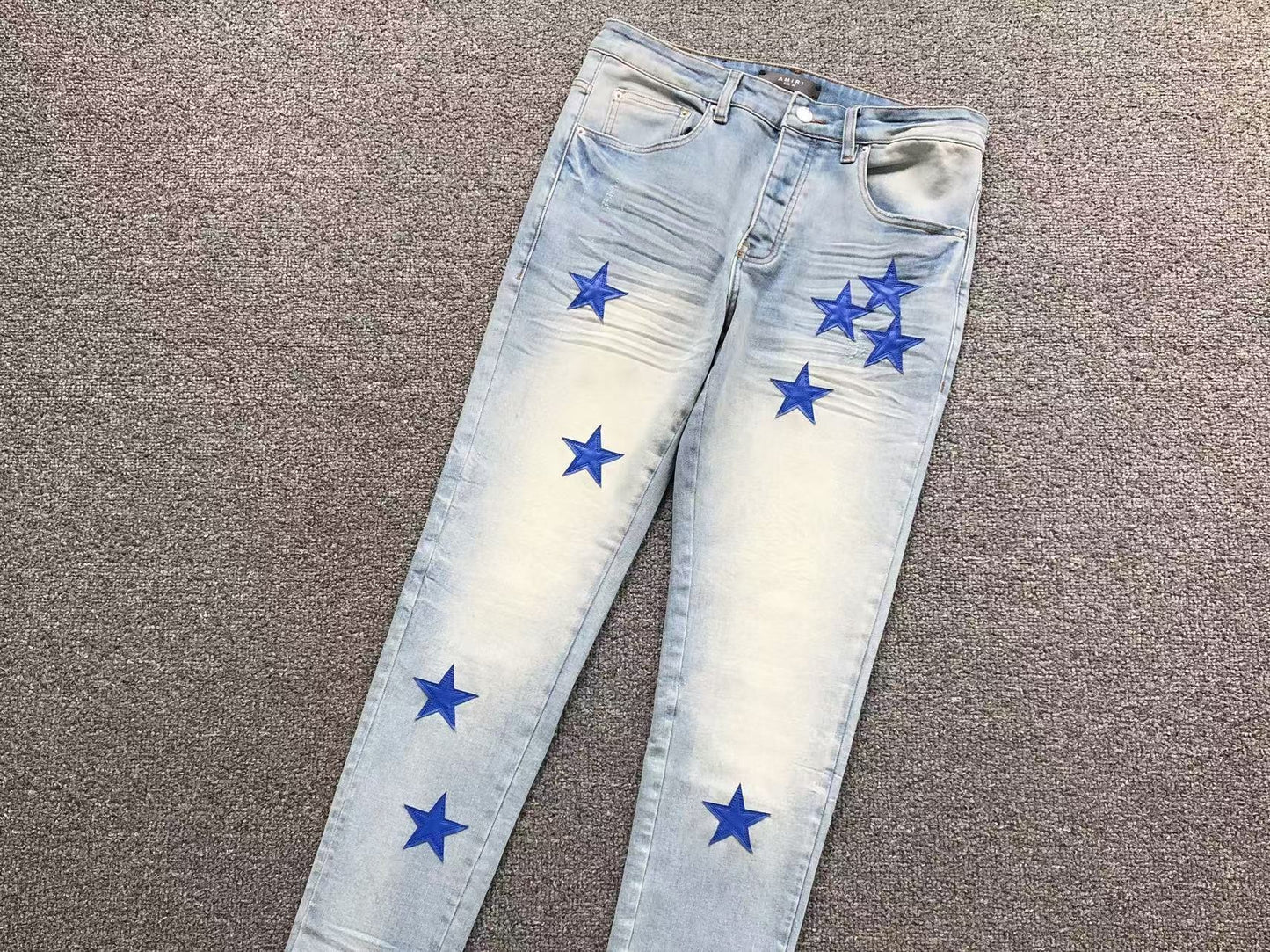 Calça AMIRI Star Patch Light Blue Denim