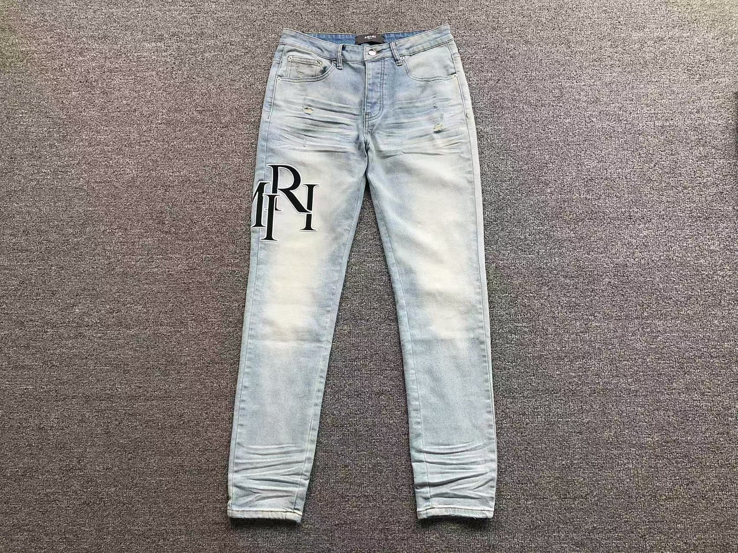 Calça AMIRI TR Monogram Ice Blue Denim
